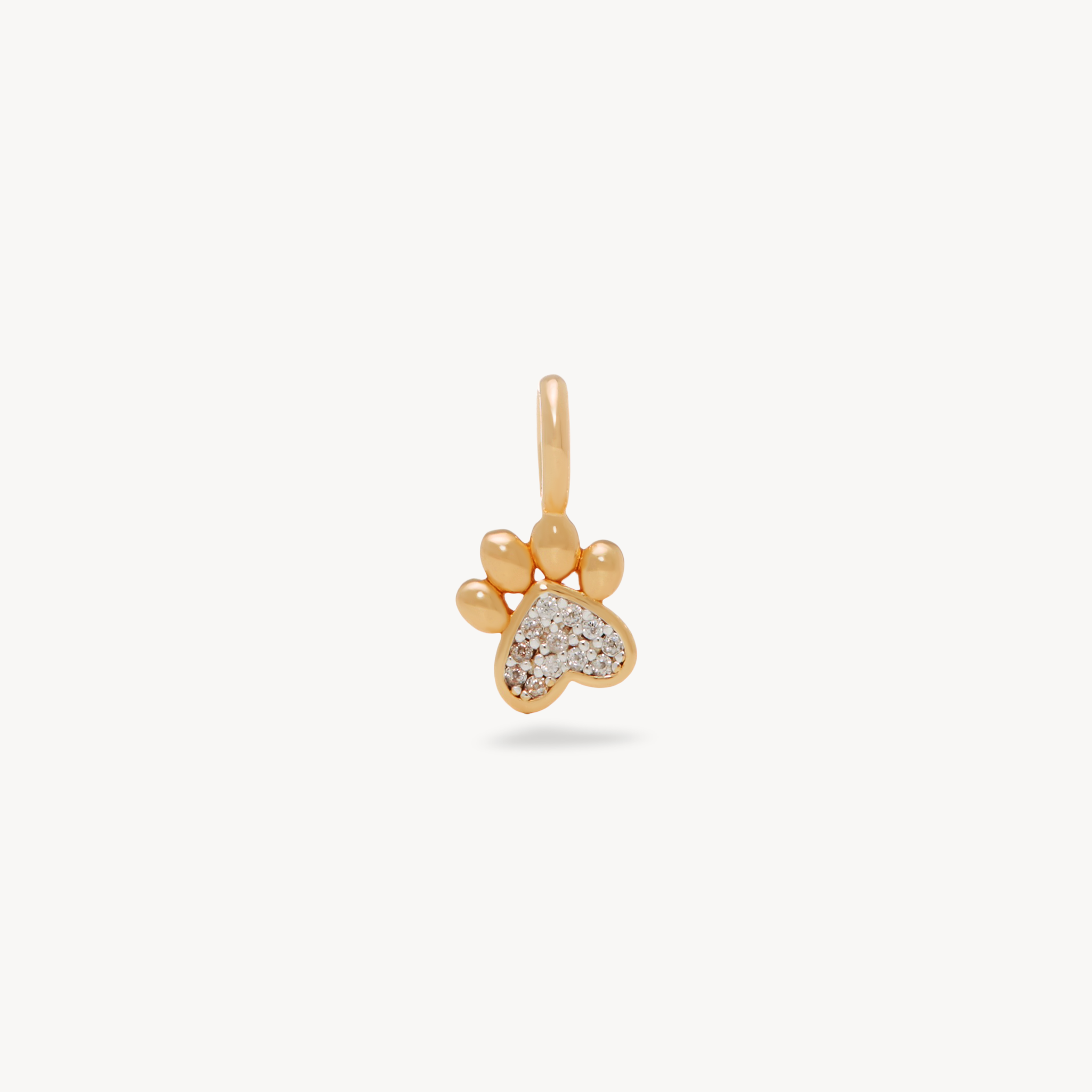 Gold dog paw charm discount