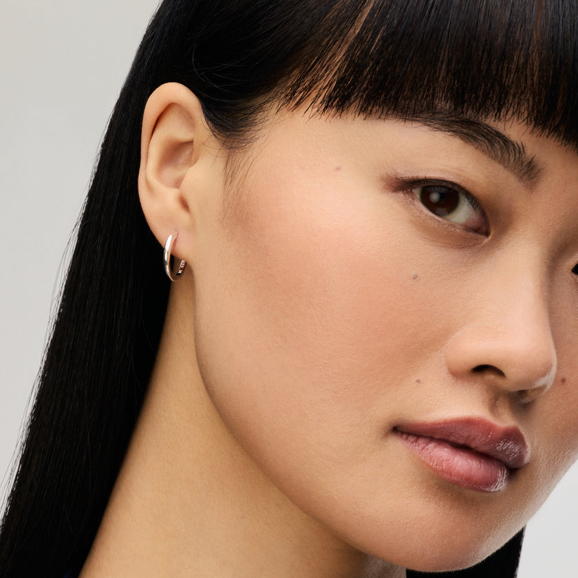 Silver Small Hoop Earrings on model