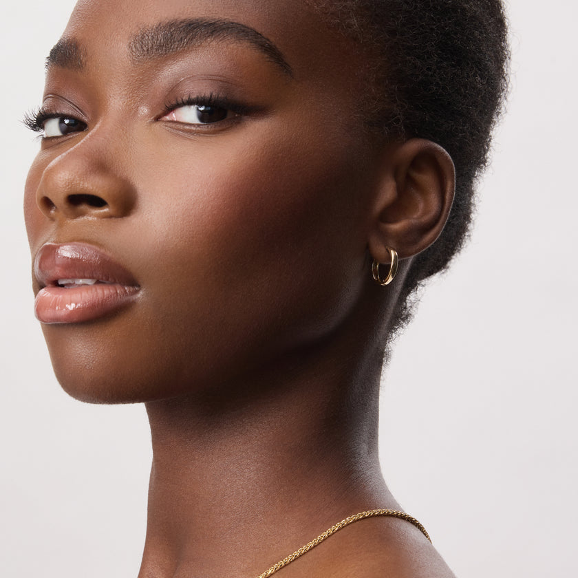16mm 10k Hoop Earrings on model