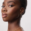 16mm 10k Hoop Earrings on model