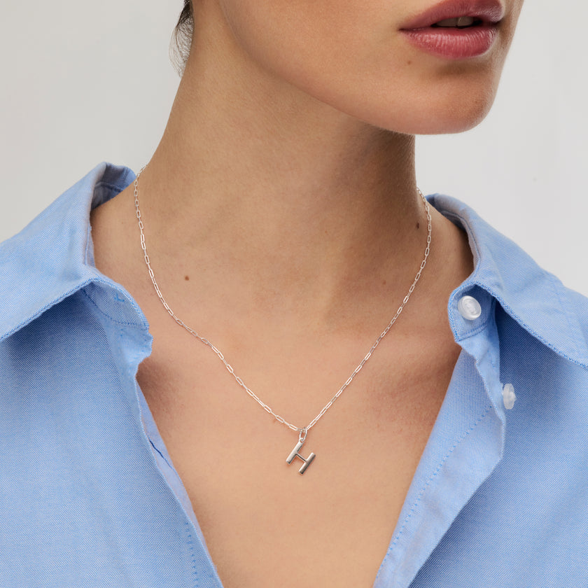 Essential Clip Chain Necklace and Silver Letter Charm on model