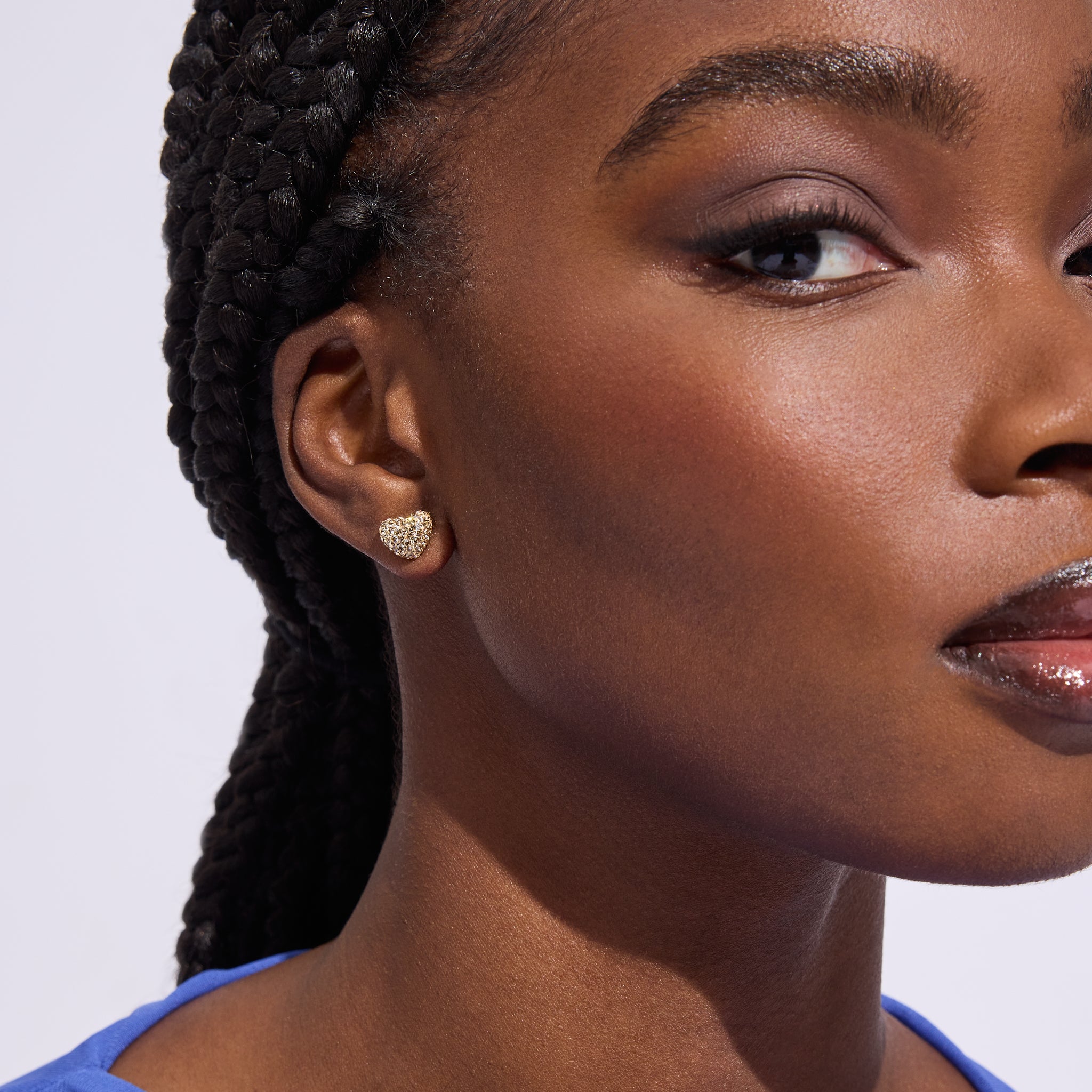 Soft Gold Sparkle Heart Stud Earrings on model