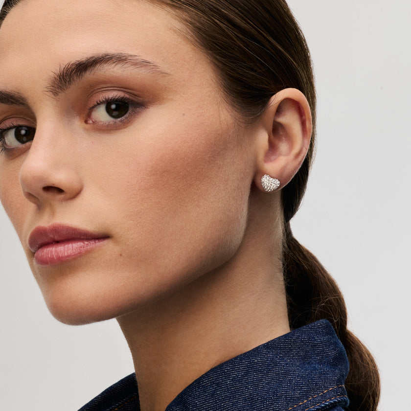 White Sparkle Heart Stud Earrings on model
