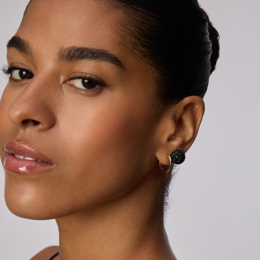 Black Medium Sparkle Ball™ Stud Earrings on model