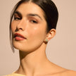 Pistachio Medium Sparkle Ball™ Stud Earrings on model
