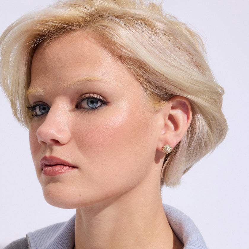 10mm Soft Gold Sparkle Ball Studs on model