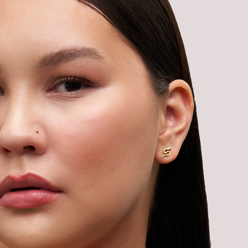 Serpent Stud Earrings Gold on model