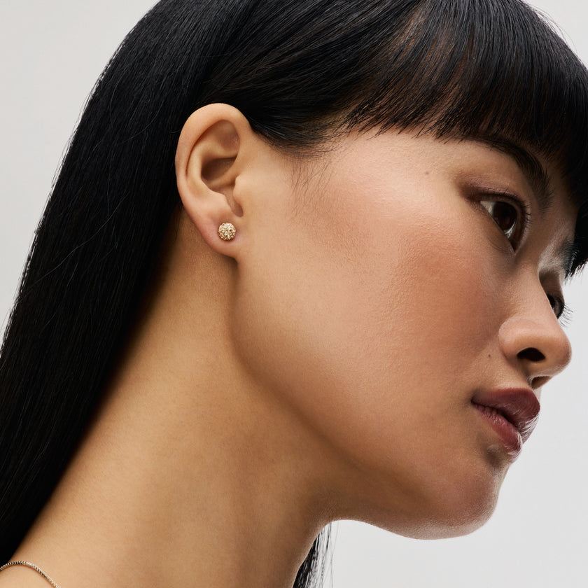 Soft Gold Mini Sparkle Ball™ Stud Earrings on model