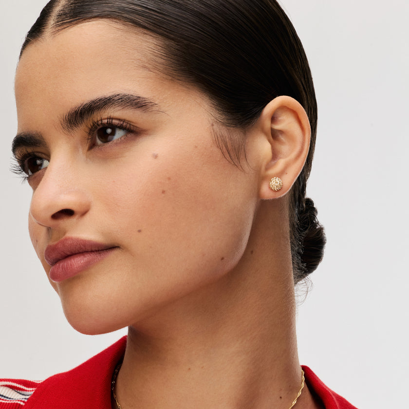 Soft Gold Small Sparkle Ball™ Stud Earrings on model