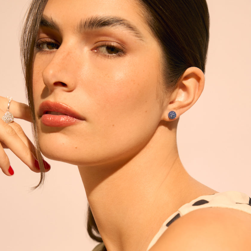 Small Capri Blue Sparkle Ball™ Stud Earrings on model