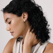 Accent Pearl Studs on model