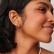 Amber & Gold Sparkle Reversible Hoop Earrings — Small on model