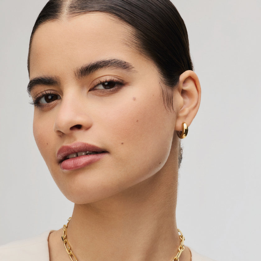 Small Bold Reversible Hoop Earrings on model