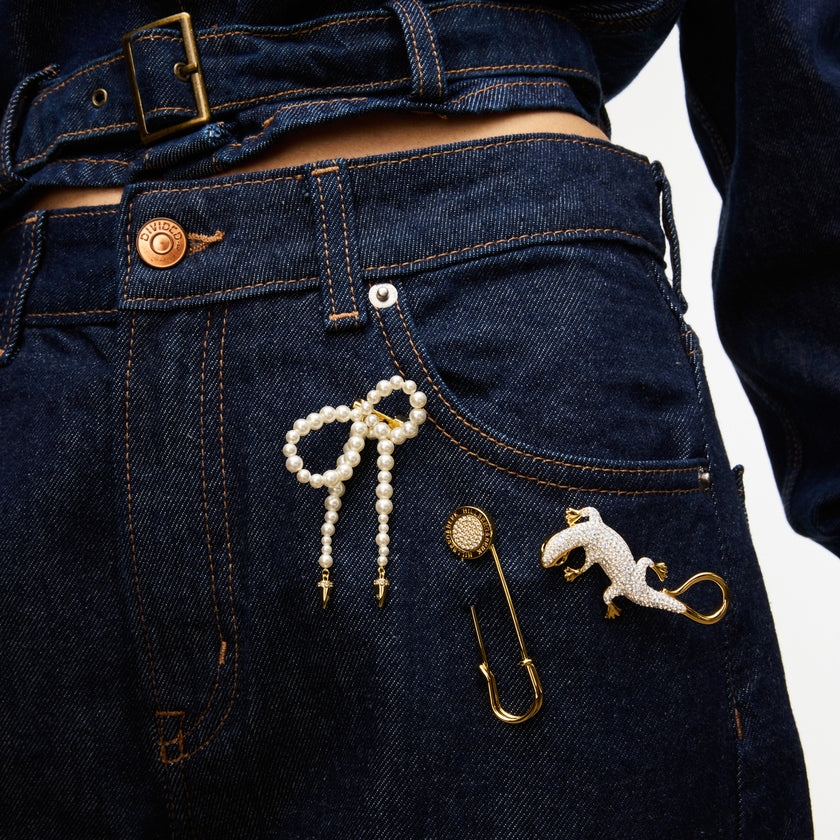 Sparkle Lizard Brooch, Safety Pin Brooch, and Pearl Brooch on model