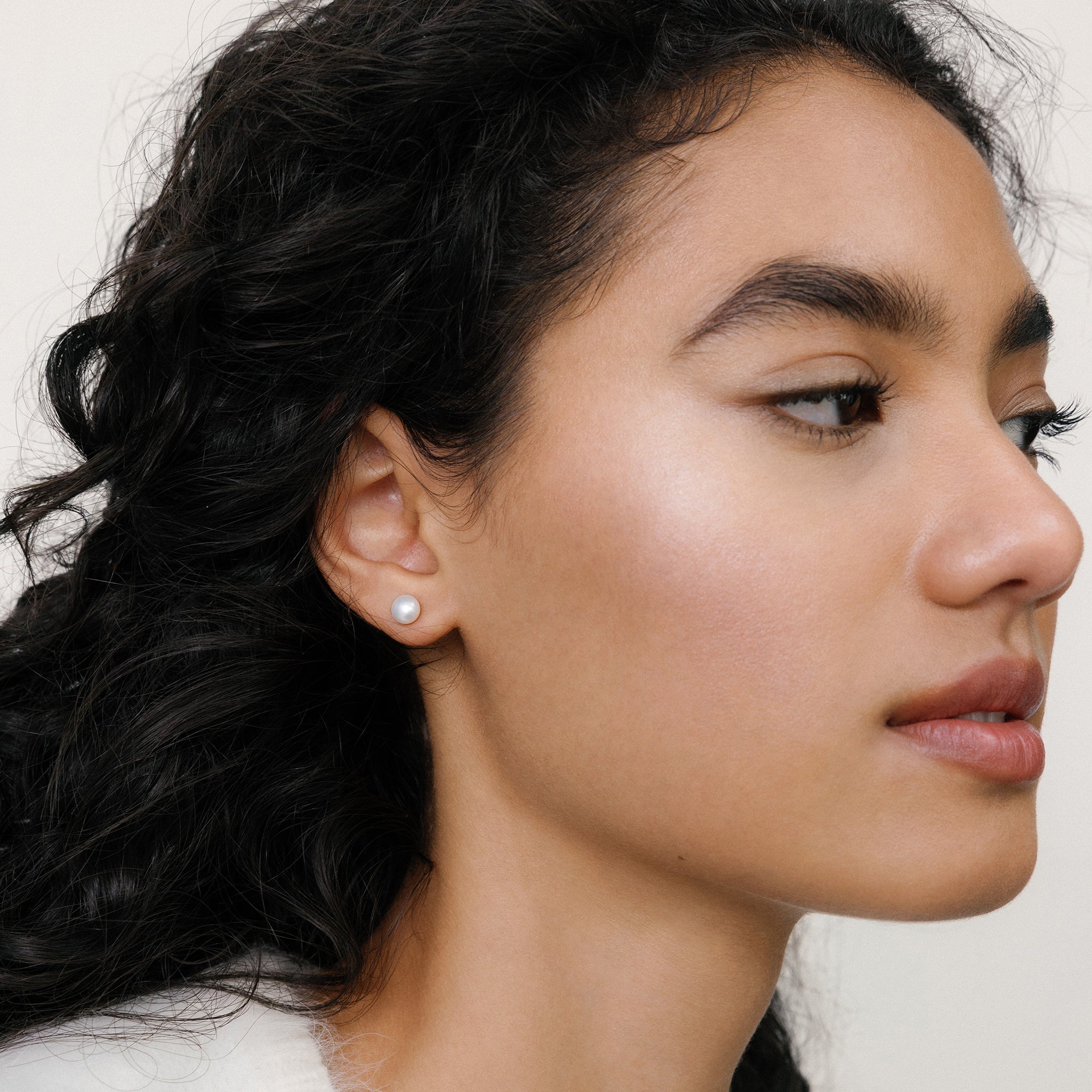 Classic Pearl Studs on model 