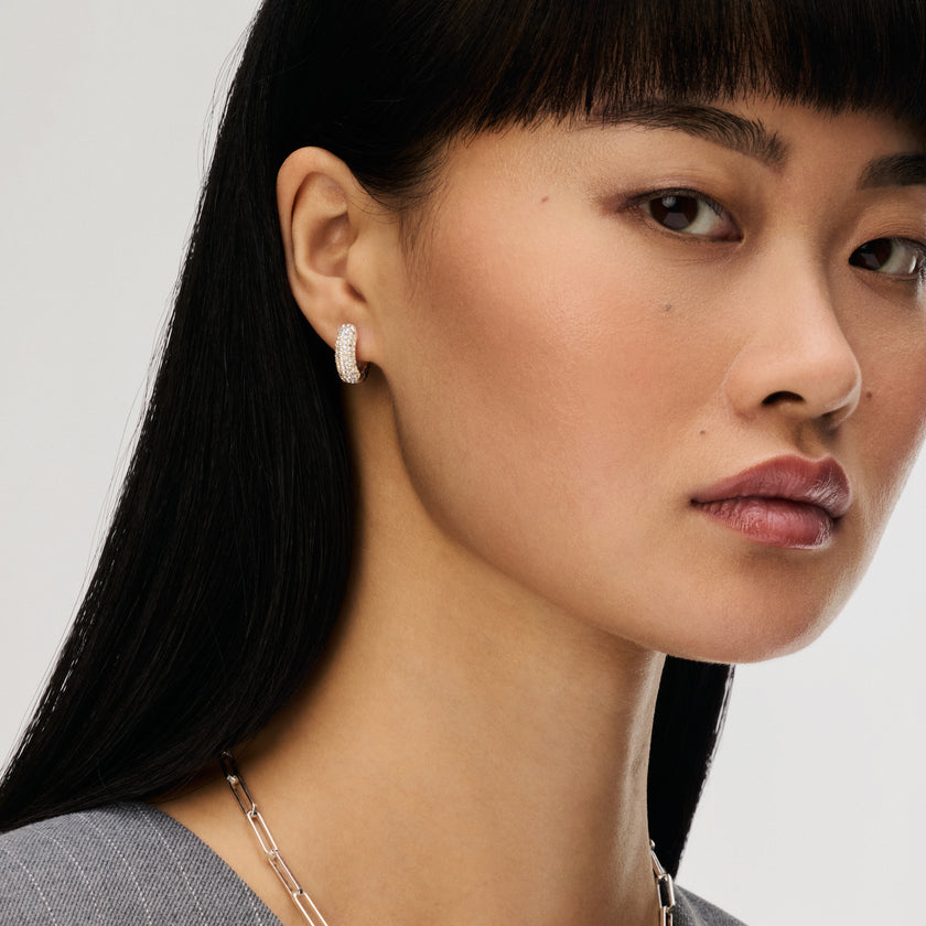 Small Two-Tone Reversible Sparkle Hoop Earrings Moonlight side on model