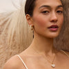 Cream Pearl Hoop Earrings on model