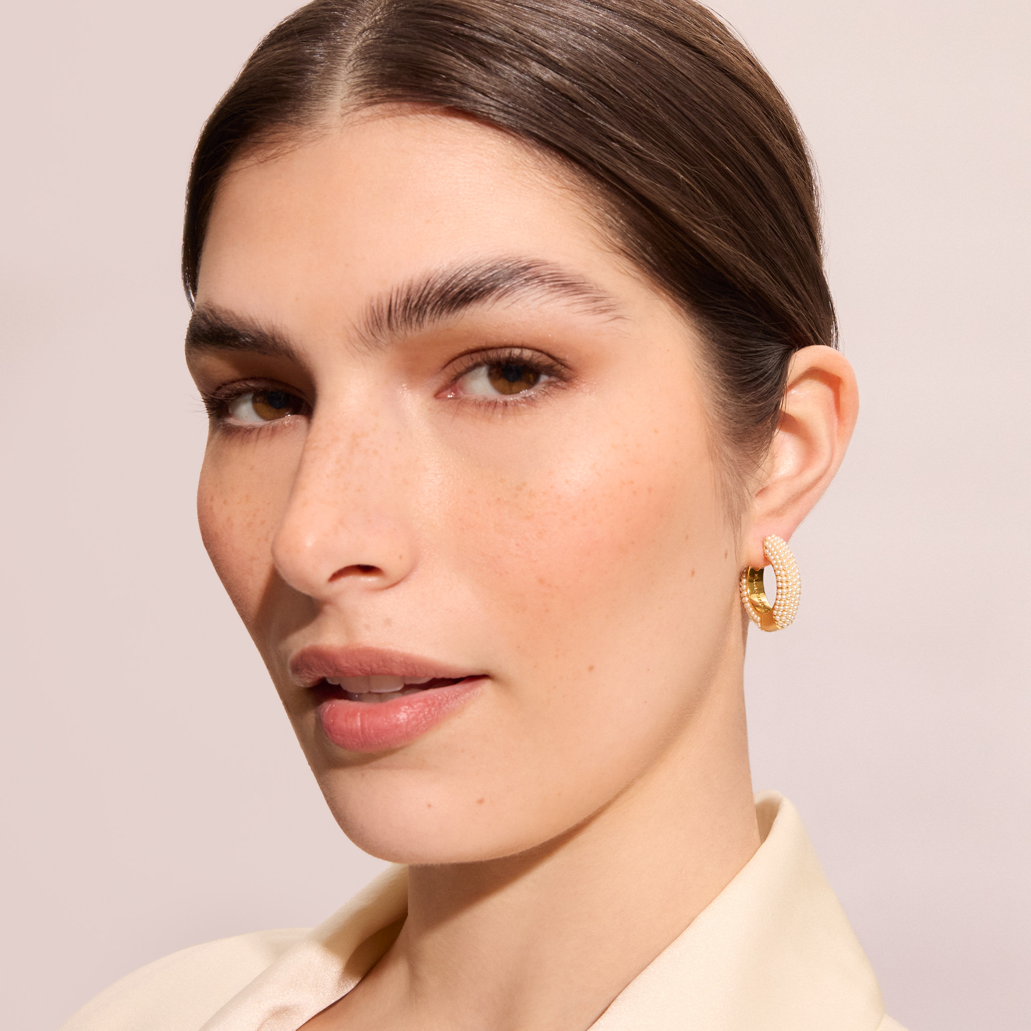 Cream Pearl Hoop Earrings on model