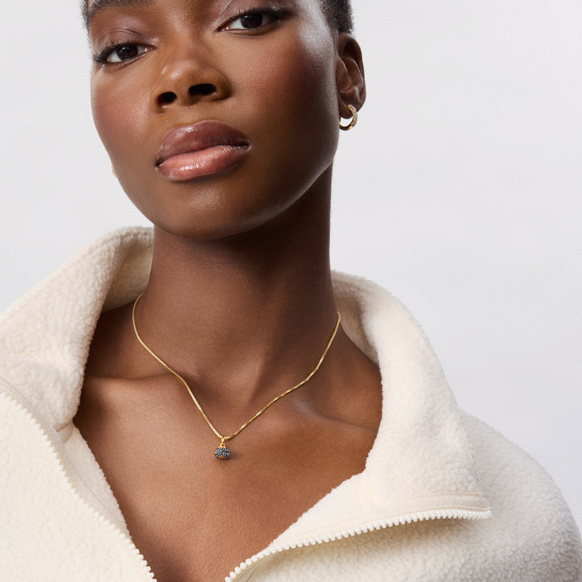 Curling Rock Charm on model