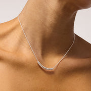 Dancing Queen Holiday Curved Bar Necklace on model