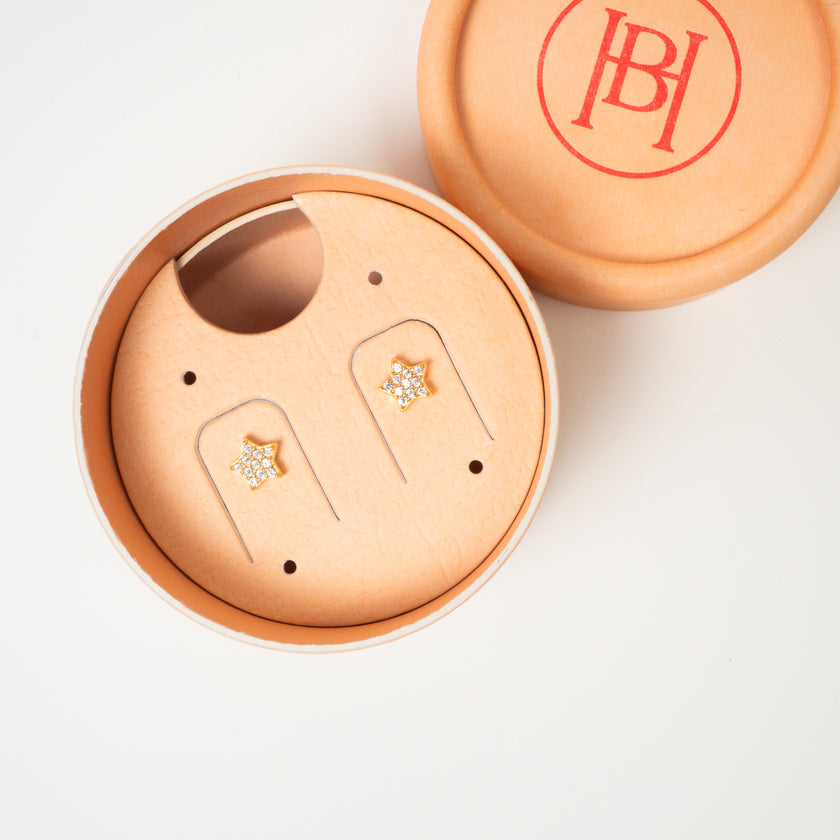 Mini Pavé Star Stud Earrings in packaging