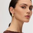 Soft Gold Dream Puff™ Sparkle Stud Earrings on model