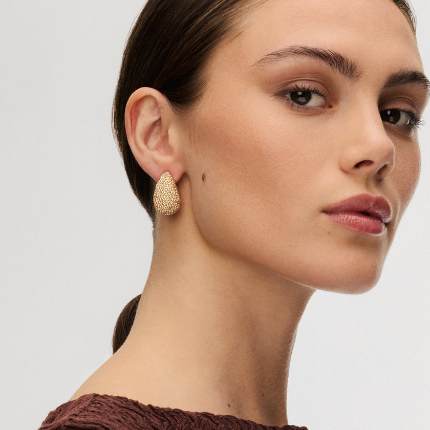Soft Gold Dream Puff™ Sparkle Stud Earrings on model