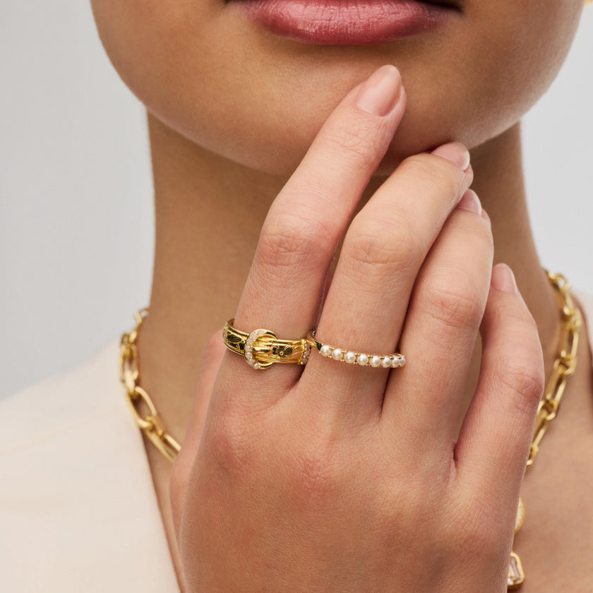 Etched Floral Buckle Ring and Pearl Eternity Ring on model
