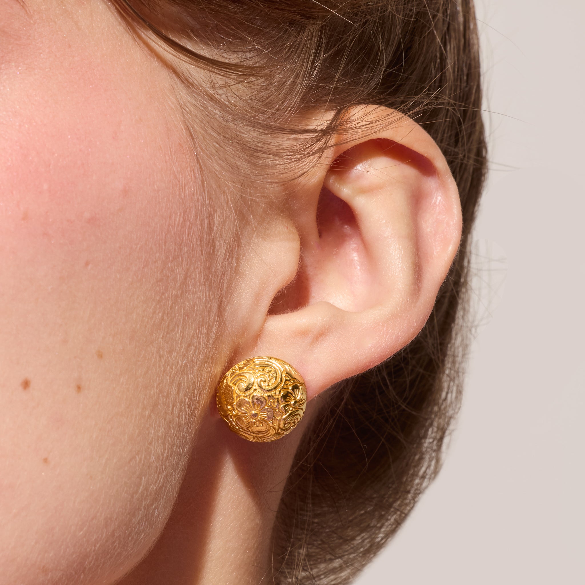 Etched Floral Stud Earrings on model