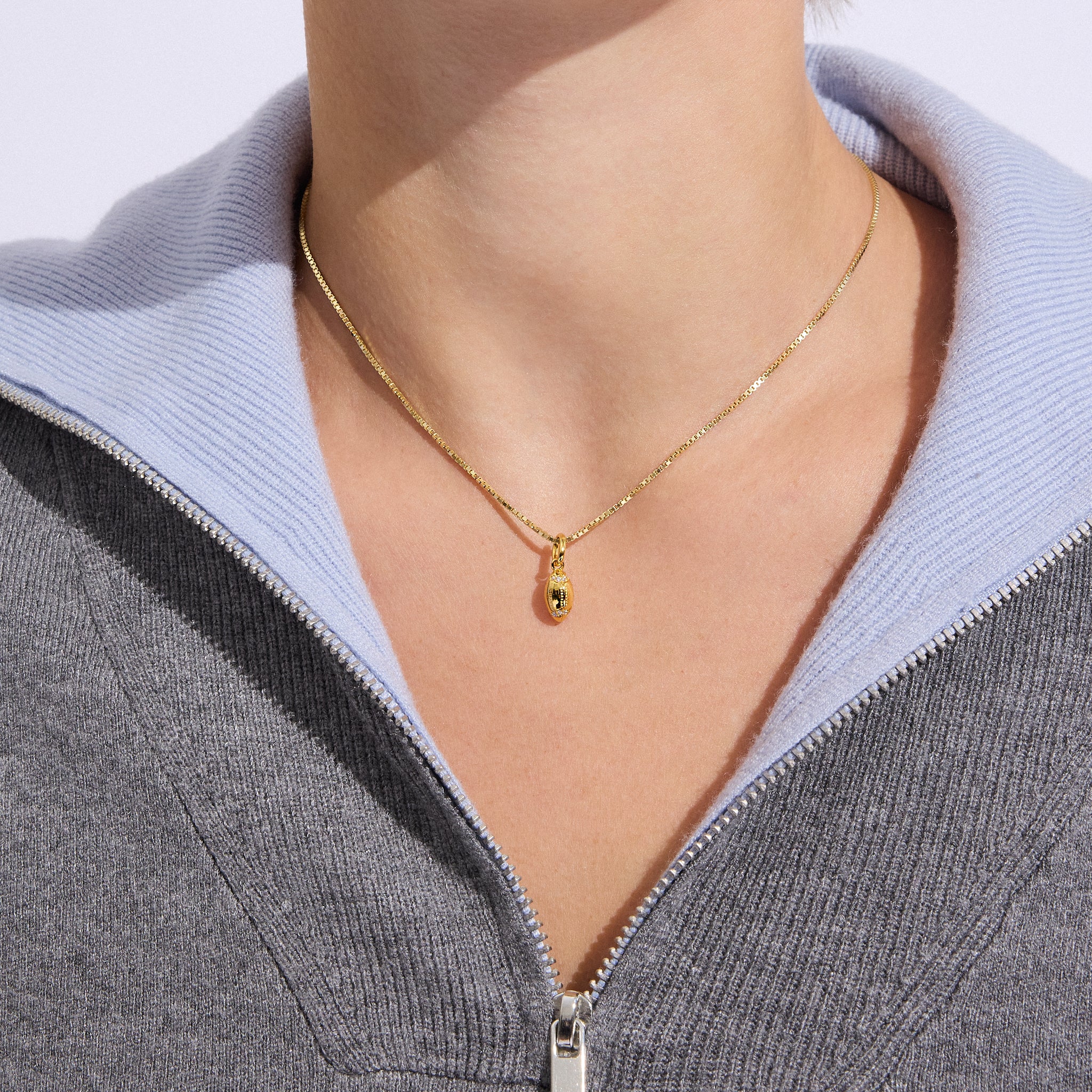 Football Charm Gold on model