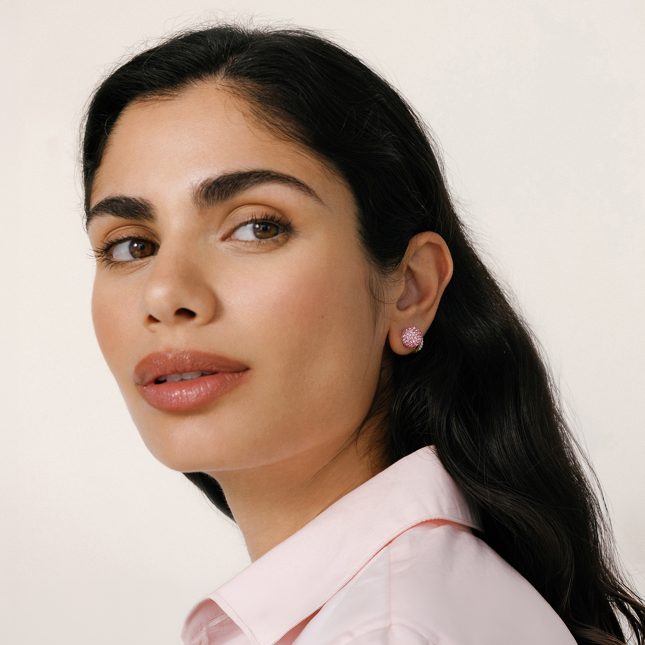 Medium H&B Pink Sparkle Ball™ Stud Earrings on model