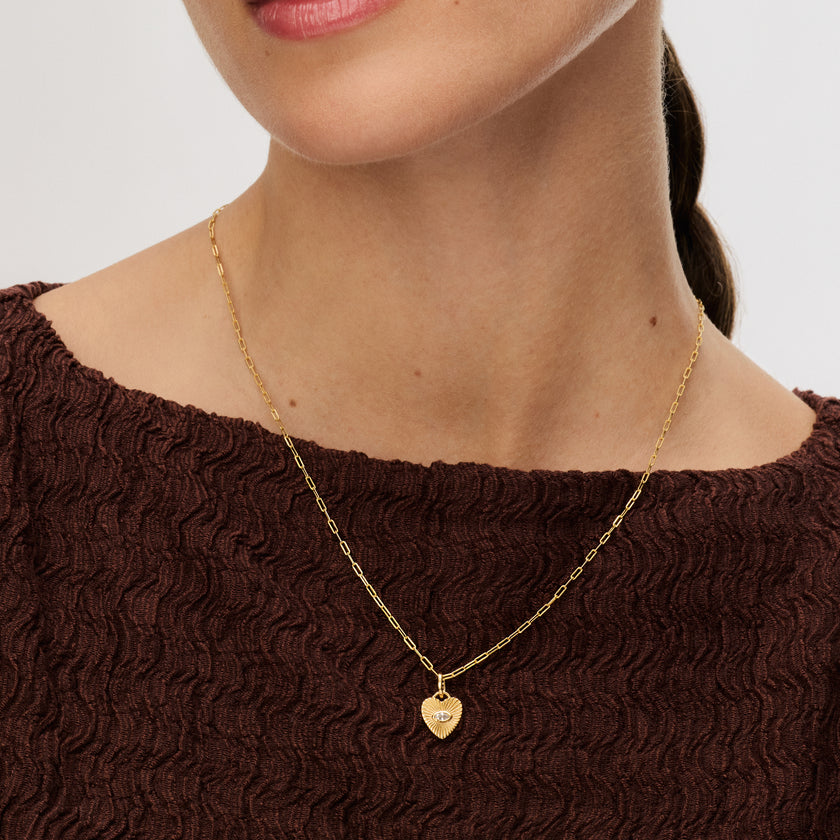 Gold Heart Beam Charm on a Gold Essential Clip Chain on model
