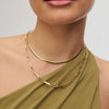 Era Chain Necklace and Heart String Chain Necklace on model in Gold
