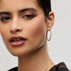 Gold Large Pavé Hoop Earrings on model