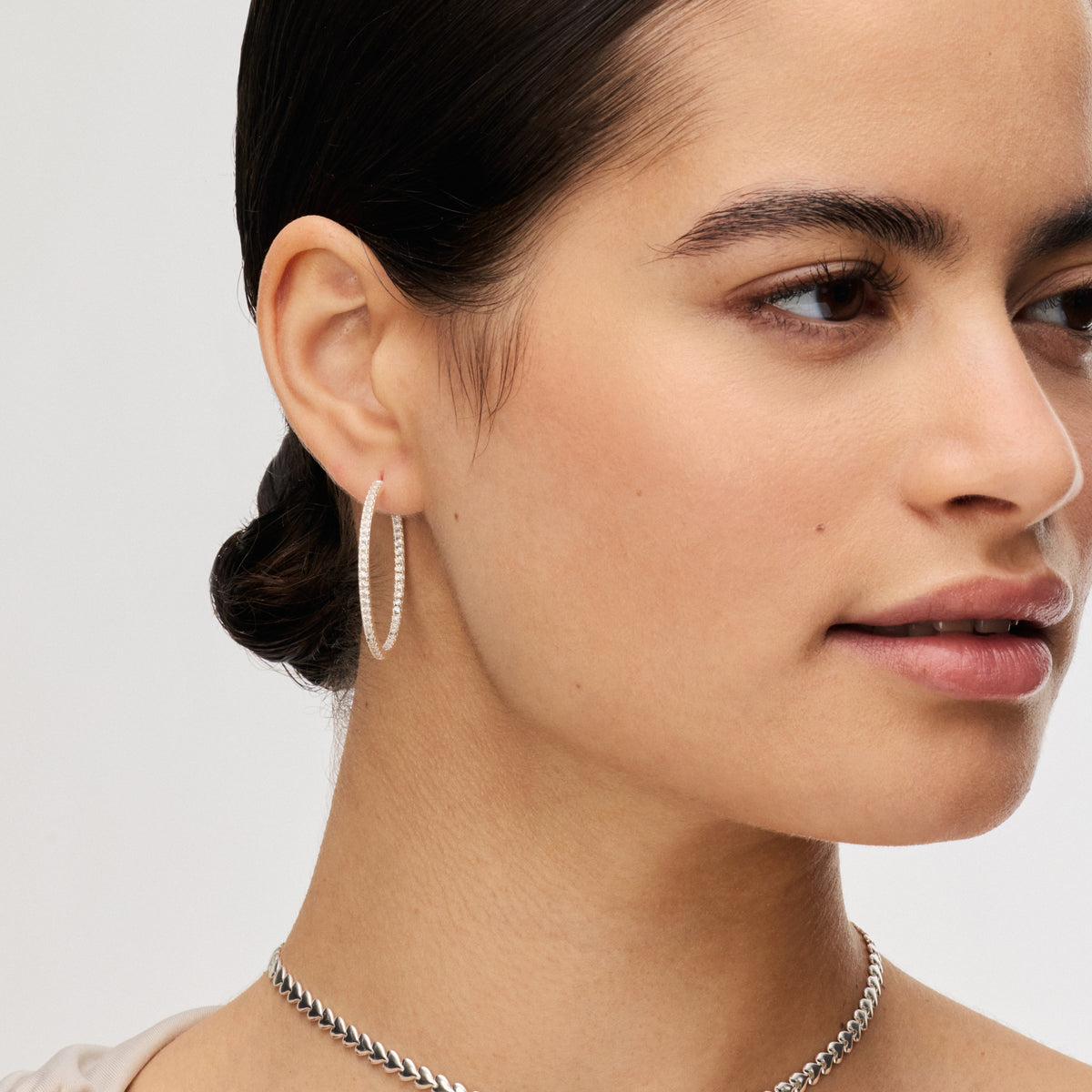 Silver Large Pavé Hoop Earrings on model