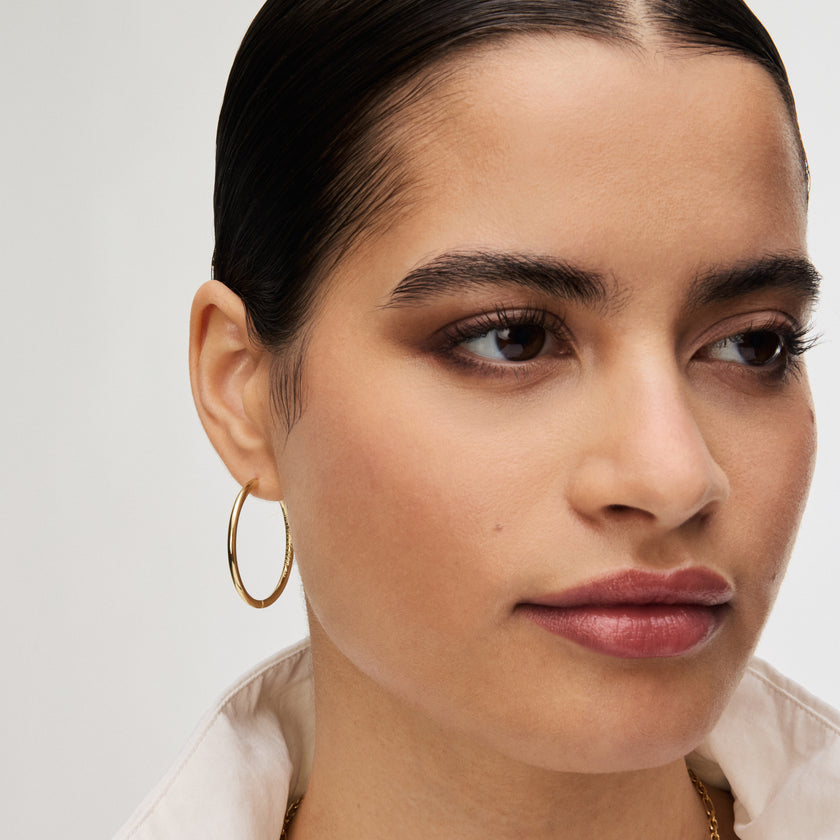 Gold Large Hoop Earrings on model