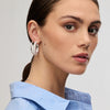 White Large Sparkle Hoop Earrings and Silver Large Hoop Earrings on model