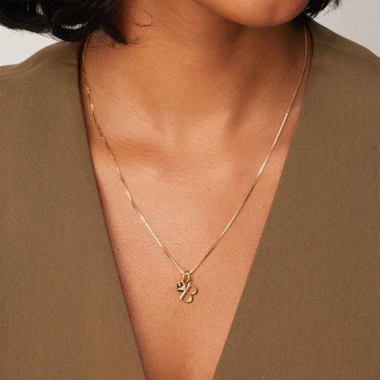 Gold Letter Necklace on model