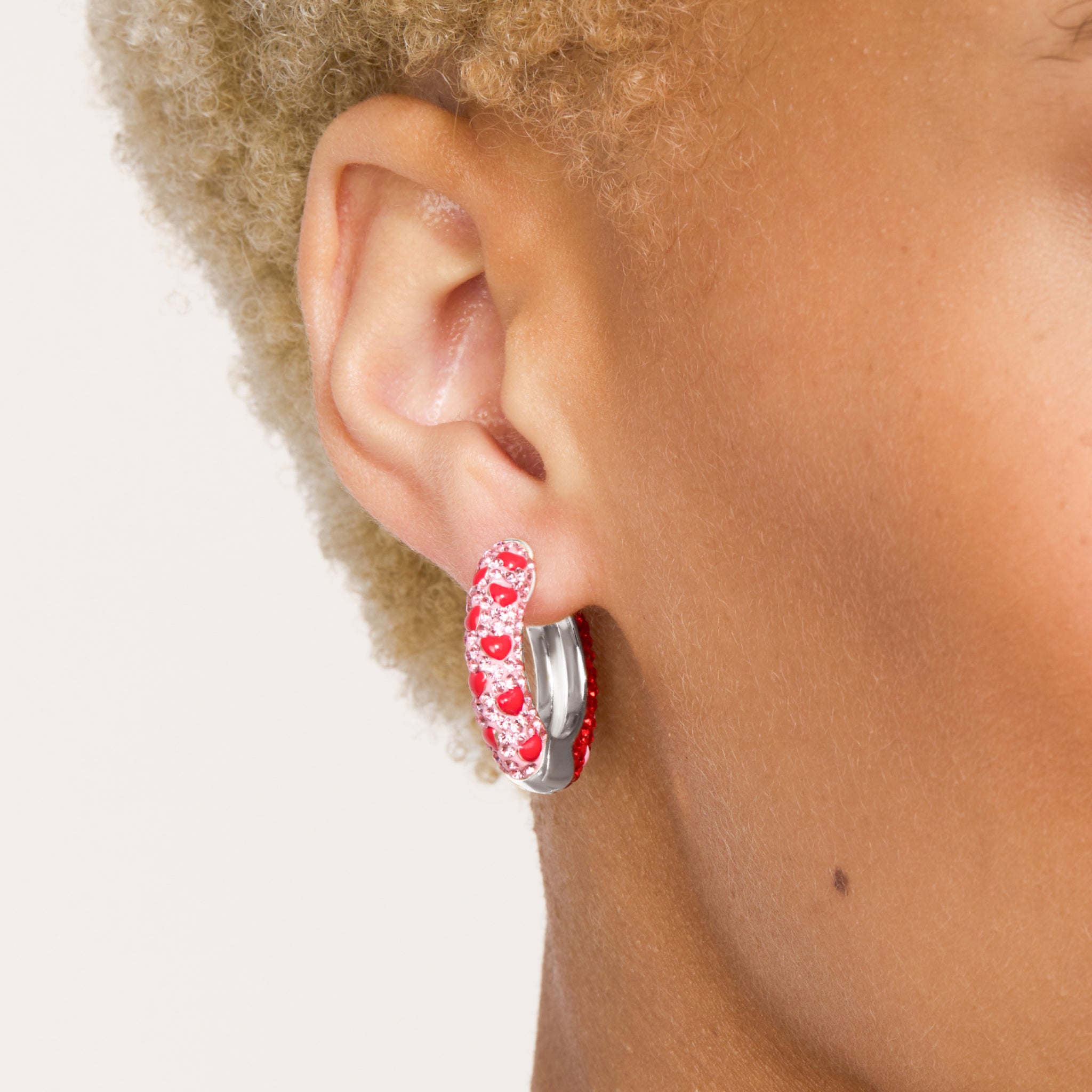 Lovestruck Medium Sparkle Reversible Hoop Earrings on model