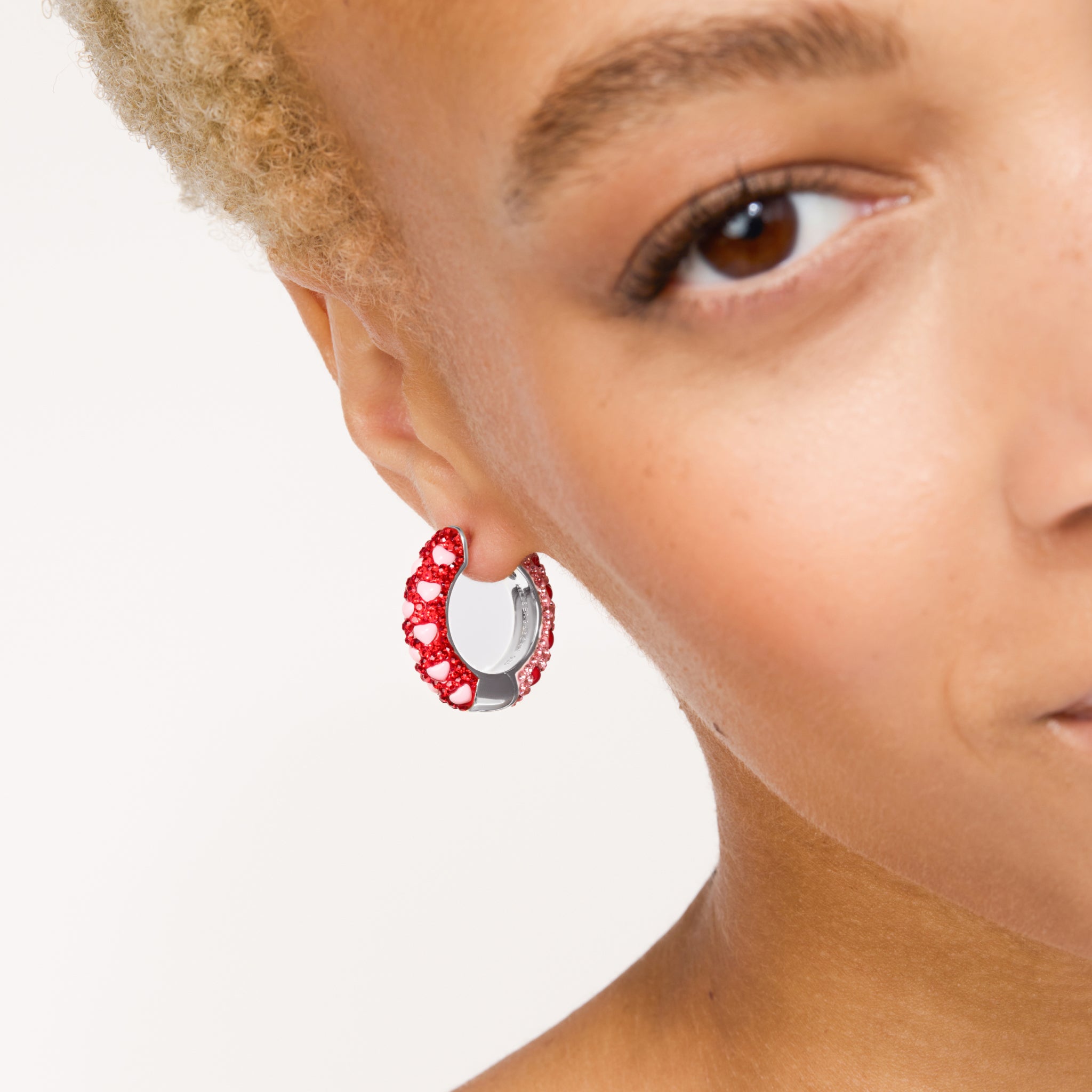 Lovestruck Medium Sparkle Reversible Hoop Earrings on model