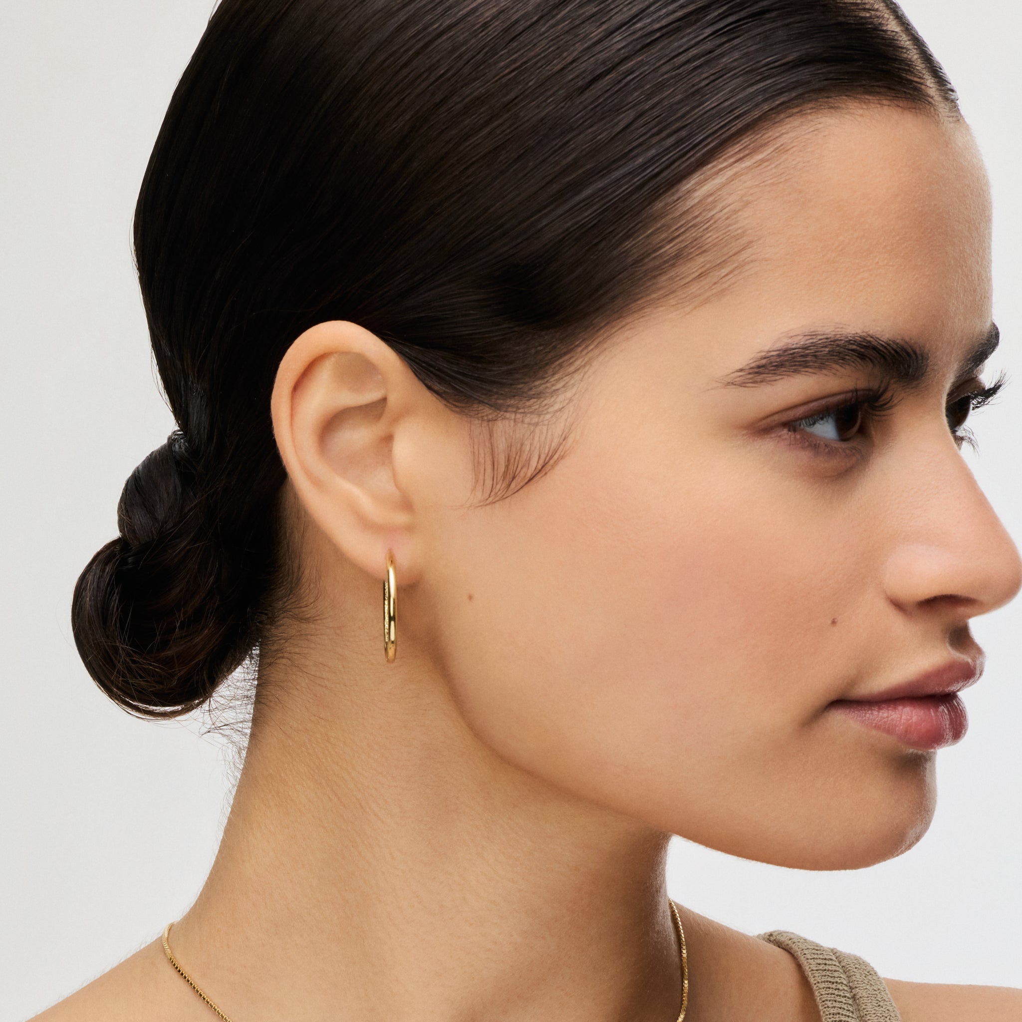 Gold Medium Hoop Earrings on model