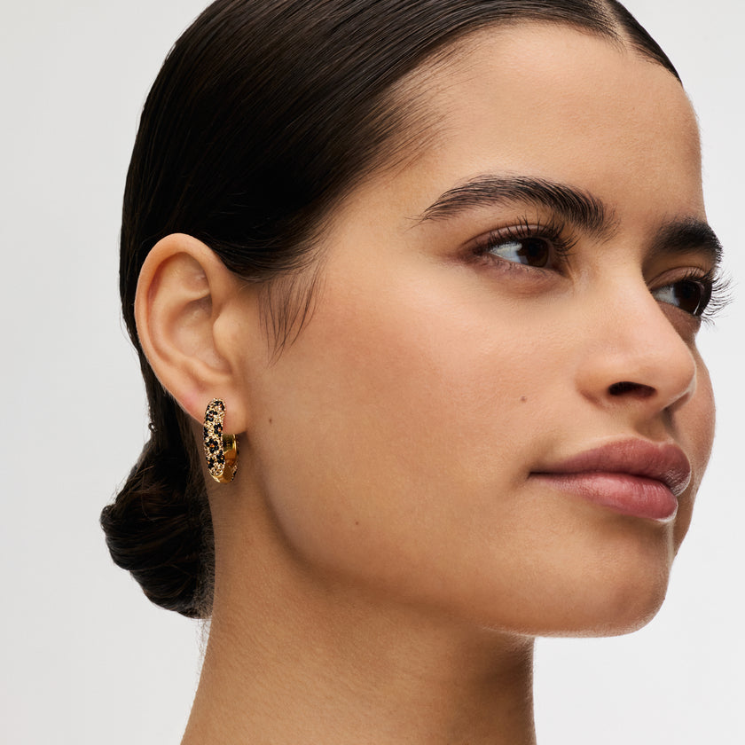 Leopard Medium Sparkle Hoop Earrings on model