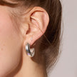 Mini Metal Lightning Stud Earrings on model