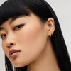 Mini Hoop Earrings and Mini Pave Hoop Earrings on model