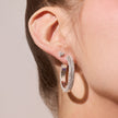 Large Sparkle Hoop Earrings White on model