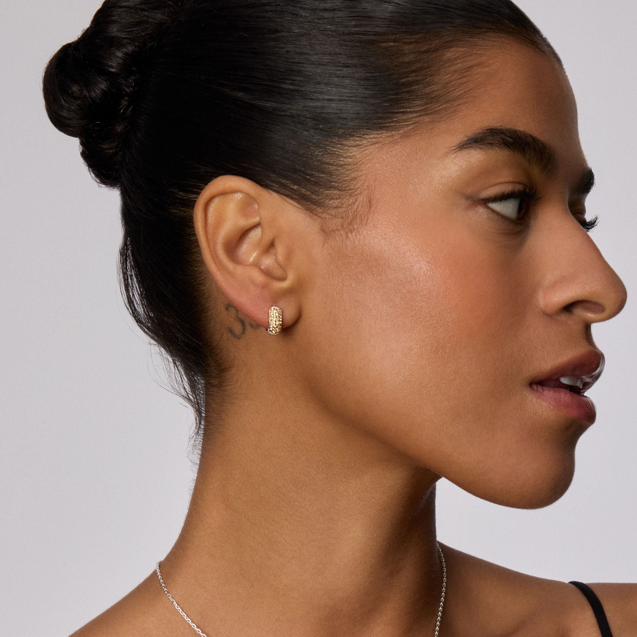 Soft Gold Mini Sparkle Hoop Earrings on model