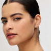 Silver Mini Pavé Ball Stud Earrings on model
