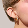 Mini Pavé Heart Stud Earrings on model