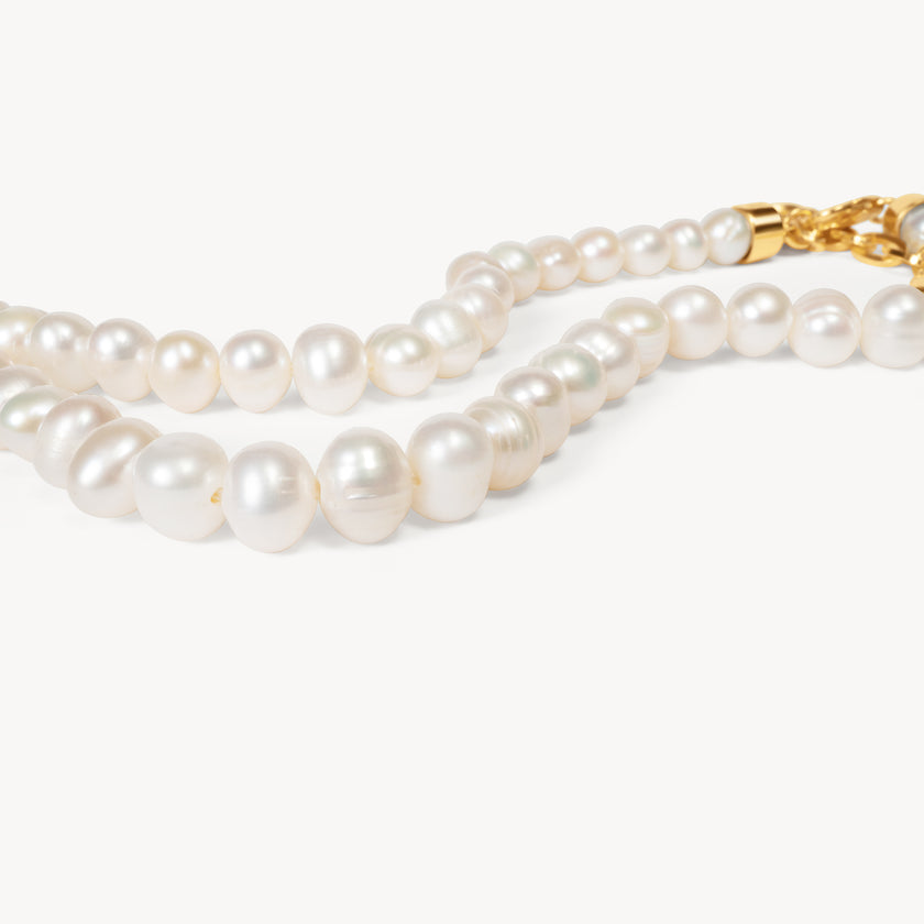 Pearl Charm Necklace Base close up of pearls