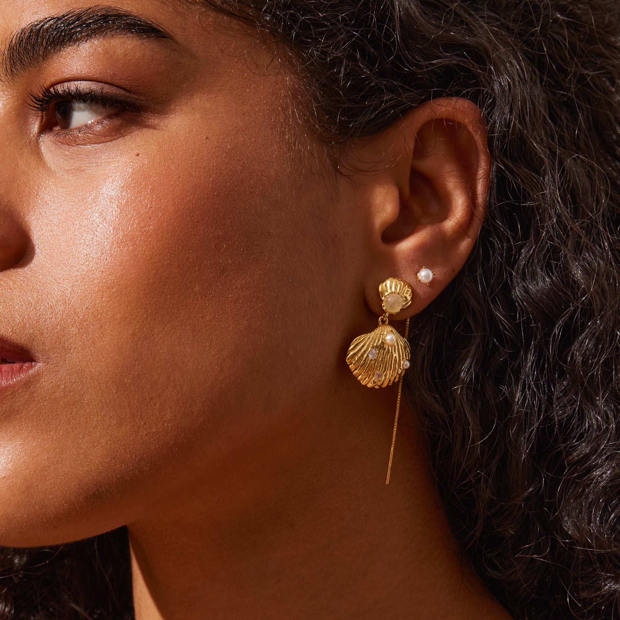 Golden Shell Drop Earrings on model